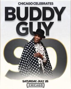 Poster celebrating Buddy Guy’s 90th shows the blues legend smiling in a black hat and polka-dot outfit in front of a large “90” graphic, with text reading “Chicago Celebrates” and the event date Saturday, July 25, Chicago.