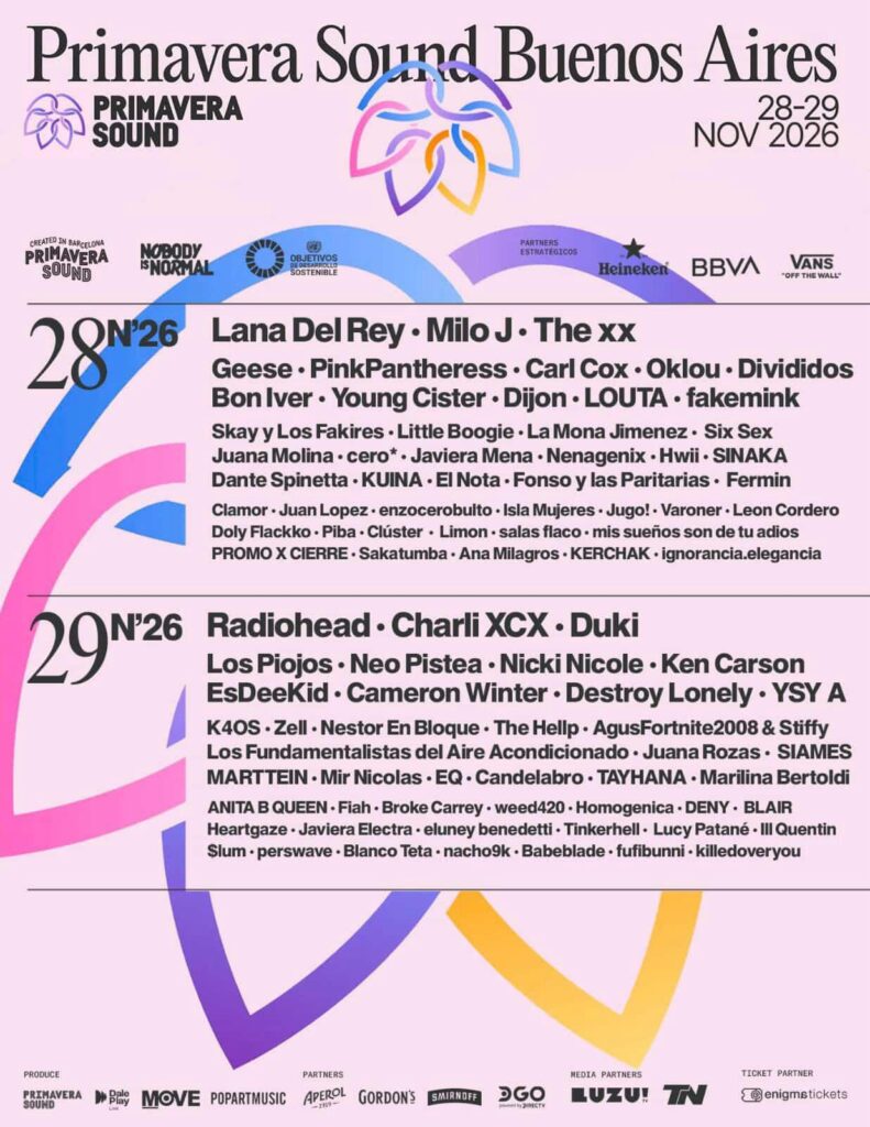 Bold pink Primavera Sound Buenos Aires lineup poster displaying dates Nov 28–29, 2026 with two large lineup sections stacked vertically, sponsor logos and festival branding. The poster presents the festival’s headliners and full artist schedule in black type.